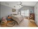 Cozy bedroom featuring a ceiling fan, a comfortable bed, and a light color scheme at 526 56Th St, Holmes Beach, FL 34217