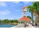 Scenic clock tower nestled among palm trees near the waterfront at 526 56Th St, Holmes Beach, FL 34217