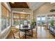 Cozy dining area with water views, a round table, and comfortable seating at 526 56Th St, Holmes Beach, FL 34217