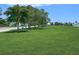 Large, well-maintained green space perfect for outdoor activities and relaxation at 526 56Th St, Holmes Beach, FL 34217