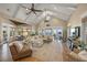 Bright living room features high ceilings, comfortable seating, and views of the intercoastal waterway at 526 56Th St, Holmes Beach, FL 34217