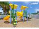 Vibrant playground with slides and climbing structures under a sunny sky at 526 56Th St, Holmes Beach, FL 34217