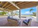 Beautiful poolside area with a spa and patio furniture perfect for relaxation and entertaining at 526 56Th St, Holmes Beach, FL 34217