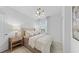 Comfortable bedroom showcasing a plush bed, soft lighting, and a serene ambiance at 5632 Summit Pointe Cir # 101, Bradenton, FL 34210