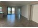 Expansive living area with large glass doors and plenty of natural light at 5632 Summit Pointe Cir # 101, Bradenton, FL 34210