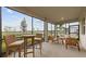 Relaxing screened patio featuring outdoor furniture to enjoy the beautiful views at 5632 Summit Pointe Cir # 101, Bradenton, FL 34210