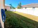 Large backyard with a well-maintained lawn, and a privacy fence, perfect for outdoor activities at 6631 63Rd E Ter, Bradenton, FL 34203