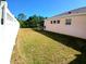 Expansive backyard with an enclosed pool area and privacy fence, ideal for relaxation at 6631 63Rd E Ter, Bradenton, FL 34203