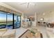 Inviting living room open to the kitchen and a balcony with lovely scenic views at 7005 River Hammock Dr # 402, Bradenton, FL 34212