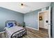 Bedroom featuring wood-look floors has ample light and closet space for a cozy, organized retreat at 7107 58Th E Ter, Palmetto, FL 34221