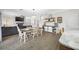 Open floor plan with dining area connecting to the living room and featuring a fireplace at 7107 58Th E Ter, Palmetto, FL 34221