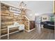 Foyer area features rustic wood accents, a staircase, and views into the living space at 7107 58Th E Ter, Palmetto, FL 34221
