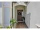Charming front entry with brick pavers and tasteful landscaping at 7113 Whittlebury Trl, Bradenton, FL 34202