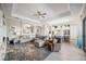 Open concept living area showcasing seamless transition to the kitchen and views of the backyard at 7113 Whittlebury Trl, Bradenton, FL 34202
