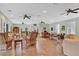 Spacious clubhouse featuring comfortable seating arrangements and warm lighting at 7115 Boca Grove Pl # 204, Lakewood Ranch, FL 34202