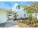 Charming coastal home with unique architecture, lush tropical landscaping, and beach access at 722 N Manasota Key Rd, Englewood, FL 34223