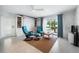 Open concept living room with views of the ocean and cozy seating at 722 N Manasota Key Rd, Englewood, FL 34223