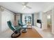 Living room with waterfront views and comfortable seating with a built-in murphy bed at 722 N Manasota Key Rd, Englewood, FL 34223