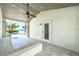 Covered patio with tile floors and a view of the white sand beach and ocean at 722 N Manasota Key Rd, Englewood, FL 34223