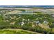 Comprehensive aerial view of a developing community with lakes and residential areas nearby at 7407 91St E St, Palmetto, FL 34221