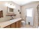 Bathroom with tiled floor, vanity and mirror at 7407 91St E St, Palmetto, FL 34221