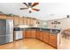 Charming kitchen with wooden cabinets and stainless steel appliances at 7407 91St E St, Palmetto, FL 34221