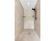 Tiled walk-in shower featuring a rain shower head, shelving and tile flooring at 7407 91St E St, Palmetto, FL 34221
