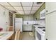 An expansive kitchen features plenty of storage and cooking space at 7461 W Country Club Dr N # 408, Sarasota, FL 34243