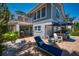 Spacious backyard with patio, lounge chairs, and an inviting atmosphere for outdoor enjoyment at 750 Tarawitt Dr, Longboat Key, FL 34228