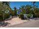 Tranquil backyard featuring a patio with lounge chairs and outdoor seating near the pool at 750 Tarawitt Dr, Longboat Key, FL 34228