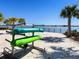 Several kayaks are stored on a rack near the shore of a lake at 7864 Grande Shores Dr, Sarasota, FL 34240