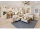 Spacious living room with an open layout, seamlessly connecting to the modern kitchen at 7864 Grande Shores Dr, Sarasota, FL 34240