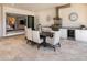 Spacious outdoor dining and kitchen with stainless appliances, view to the pool and sliding doors to indoors at 7864 Grande Shores Dr, Sarasota, FL 34240