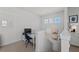 Second floor landing with a workspace and natural light at 8067 Waterbend Trl, Sarasota, FL 34240
