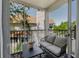 Relax on the screened balcony with comfortable seating and enjoy scenic views of the surrounding landscape at 850 S Tamiami Trl # 836, Sarasota, FL 34236