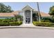 Elegant clubhouse with manicured landscaping offering community gathering spaces, enhancing the neighborhood's appeal at 850 S Tamiami Trl # 836, Sarasota, FL 34236