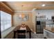 Cozy dining area with a window seat and a view of the kitchen at 850 S Tamiami Trl # 836, Sarasota, FL 34236