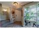 Welcoming entrance area leading to a screened patio, with natural light and ample space at 850 S Tamiami Trl # 836, Sarasota, FL 34236