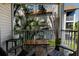 Relaxing screened patio area with comfortable seating and views of lush landscaping at 850 S Tamiami Trl # 836, Sarasota, FL 34236