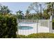 Fenced in community pool with lush landscaping, is a great recreational amenity to enjoy during hot weather at 850 S Tamiami Trl # 836, Sarasota, FL 34236