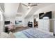 Inviting bedroom featuring a sloped ceiling, work area and a charming window seat for relaxing at 861 Nectar Rd, Venice, FL 34293