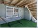 Inviting covered outdoor nook featuring a relaxing hammock, perfect for enjoying leisurely moments and shaded comfort at 861 Nectar Rd, Venice, FL 34293