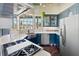 Bright kitchen features stainless steel appliances and sink with window views at 861 Nectar Rd, Venice, FL 34293
