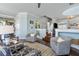 Spacious living room with comfortable seating, hardwood floors, and an open floor plan at 861 Nectar Rd, Venice, FL 34293