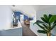 Spacious loft area with natural light, complemented by unique lighting fixtures and tasteful decor at 861 Nectar Rd, Venice, FL 34293