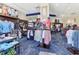 Interior of golf shop featuring clothing racks and displays with a variety of golfing merchandise at 8712 Grey Oaks Ave, Sarasota, FL 34238
