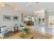 Cozy living room with elegant decor, tile flooring, and plenty of natural light at 8712 Grey Oaks Ave, Sarasota, FL 34238