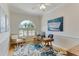 Bright home office with natural light and built in desk at 8712 Grey Oaks Ave, Sarasota, FL 34238