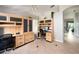 Home office features custom built-in cabinetry, tile floors and ceiling fan for added comfort at 11274 Beebalm Cir, Lakewood Ranch, FL 34202