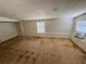 This room includes two windows and a wood subfloor, ready for your design at 1317 Venetia St, Nokomis, FL 34275